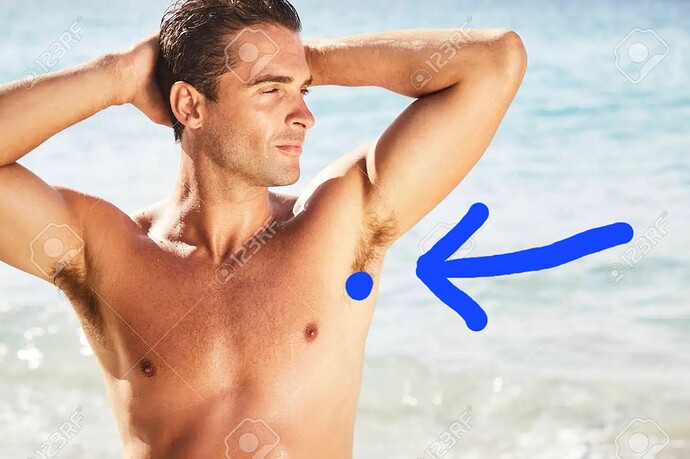 84130325-hunky-dude-at-beach-posing-and-looking-away
